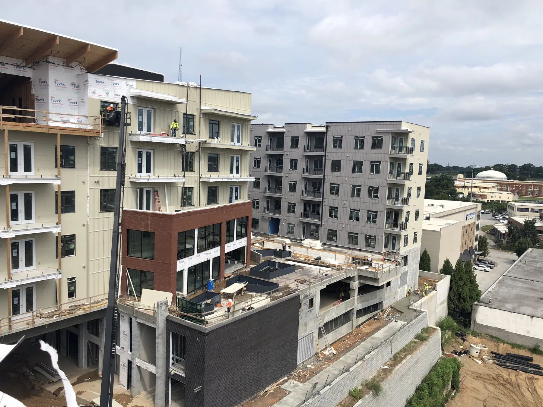 Multifamily buildings and courtyard construction at The Interlock